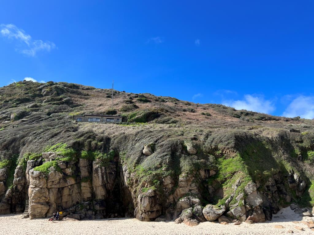 Lot: 69 - DETACHED RESIDENTIAL PROPERTY ENJOYING BREATHTAKING SEA VIEWS IN TRULY STUNNING LOCATION - Photo taken looking up to the property from the beach